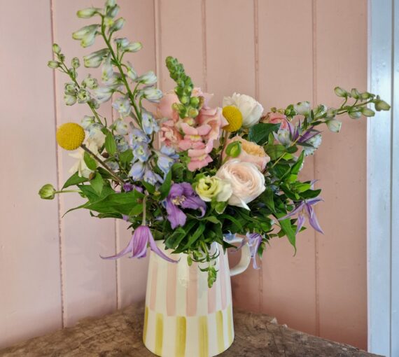 Jug of seasonal flowers